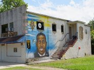 African American Cultural Center Building with a Mural of Ahmaud Arbery 