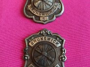 Badge numbers 1 and 20