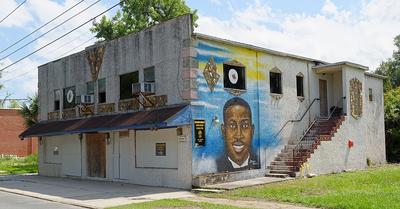 African American Cultural Center Building with a Mural of Ahmaud Arbery 
