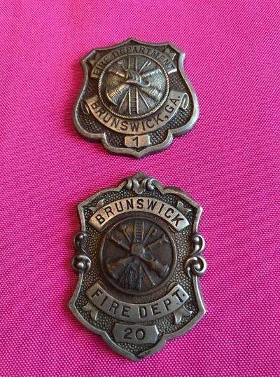 Badge numbers 1 and 20